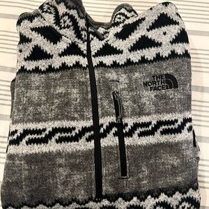 The North Face 1/4 zip. Black/White pattern. Size Medium.